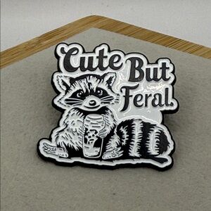 3/$25 “Cute But Feral” Raccoon Pin unisex